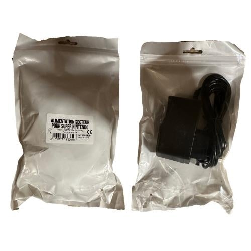 Trade Invaders Super Nintendo AC adapter  (in freaks and geeks bags + labels)