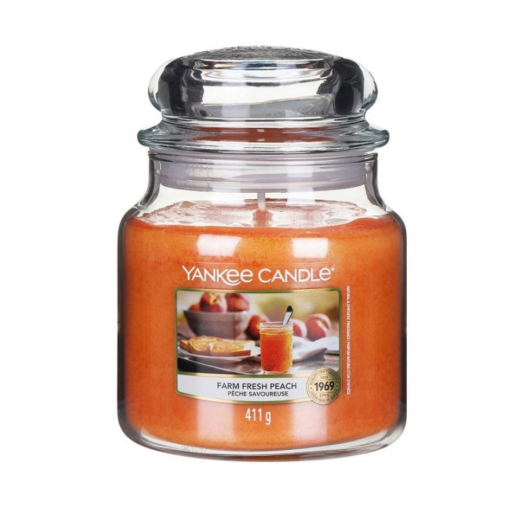 Yankee Candle Classic Medium Jar Farm Fresh Peach 411g in the group BEAUTY & HEALTH / Fragrance & Perfume / Other fragrances / Scented candles at TP E-commerce Nordic AB (C00646)