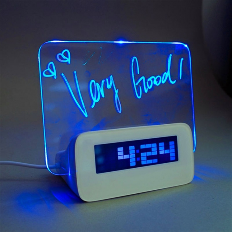 Alarm clock with memo pad