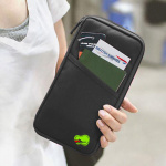 Travel wallet for passport and travel documents, black.