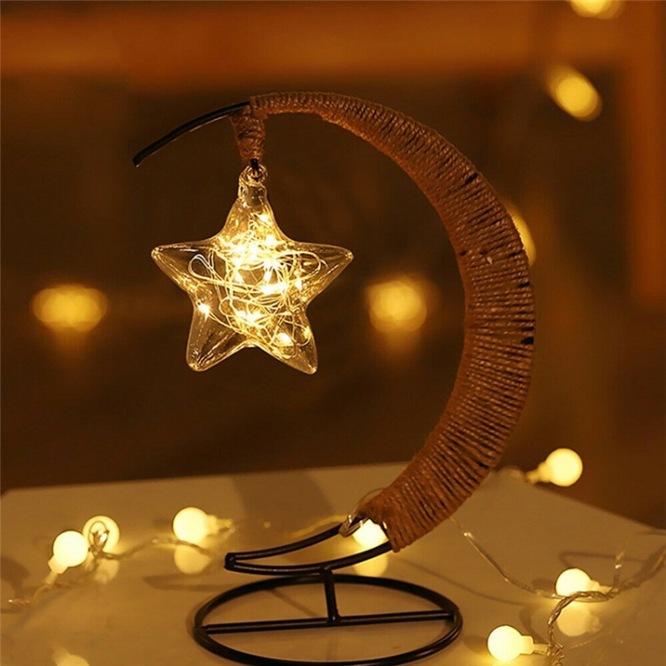 Table lamp with a hanging glass star Table lamp with a hanging glass star