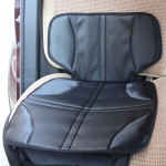 Car seat cover with practical storage pocket - protects from dirt Car seat cover with practical storage pocket - protects from dirt