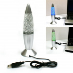 Lava lamp with glitter, lights up in several different colors.
