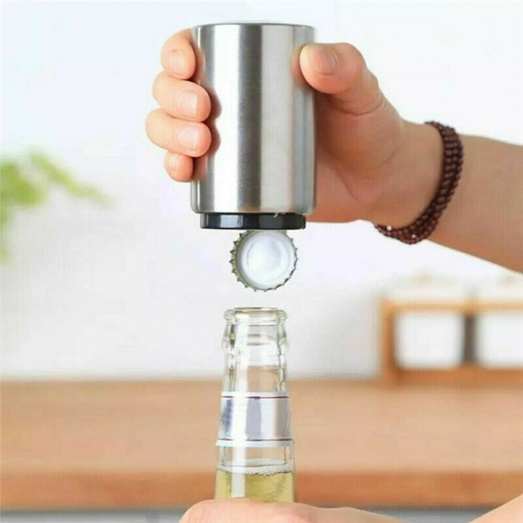 Automatic cap opener with magnet