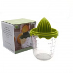 Citrus press in plastic, green.