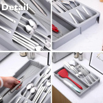 Cutlery drawer with compartments, gray. Cutlery drawer with compartments, gray.