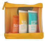 Clarins Summer Essentials Set 180 ml Youth-protecting Sunscreen SPF50+ Face 30ml/Sun Care Cream Body SPF30 75ml/Soothing After Sun Balm 75ml